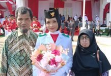 Dari Pangkalan Ojek, Nindy Mengibarkan Merah Putih di Tanah Bunda Melayu